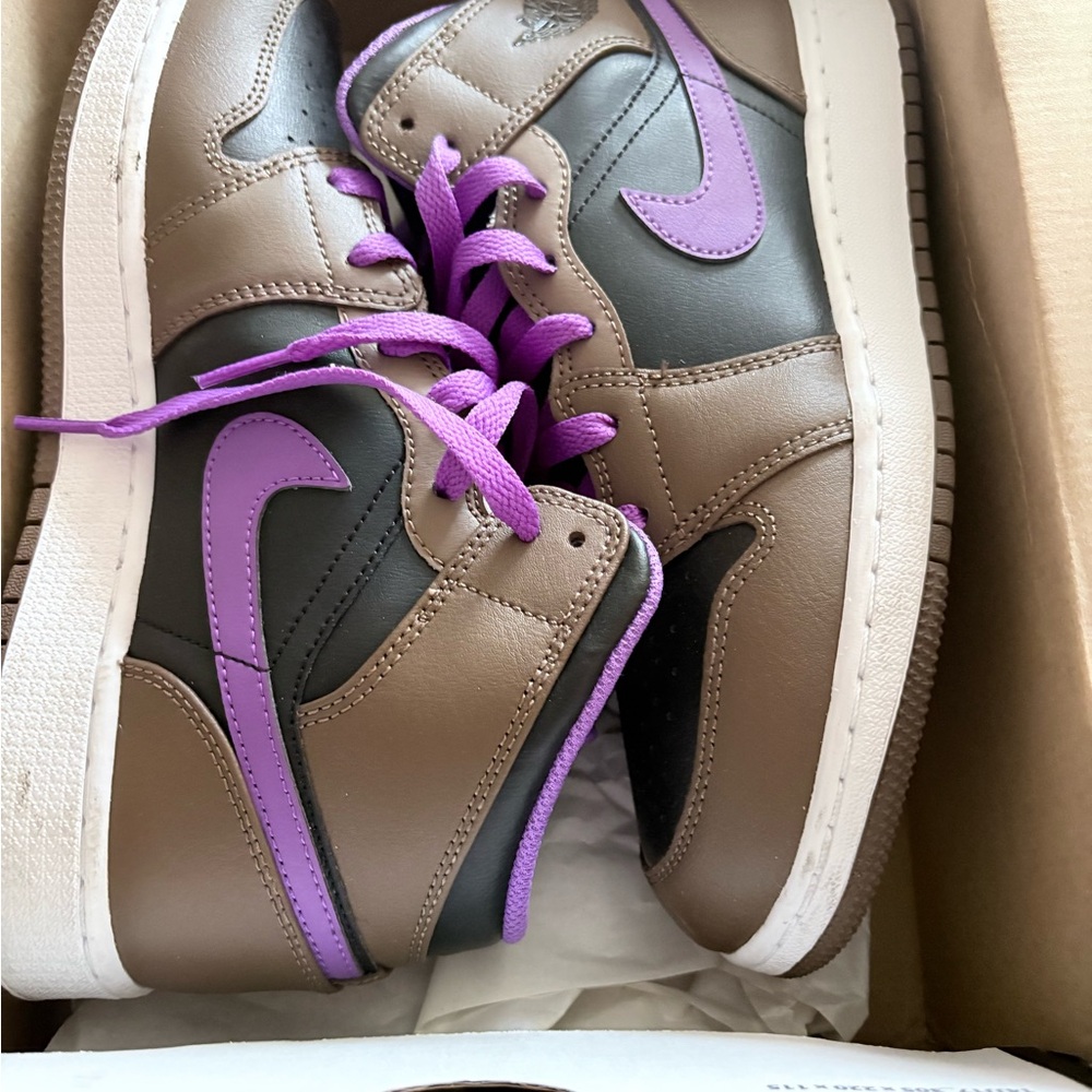 Jordan Purple and Brown Sneakers with Eye-Catching Design